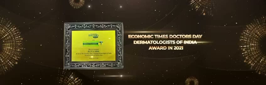 Silver-framed certificate recognising Dr. Satish as one of The Economic Times Inspiring Dermatologists of India.